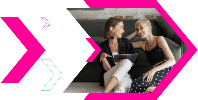 Two woman looking at iPad